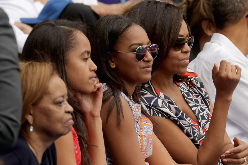 Marian Robinson, Malia Obama, Sasha Obama and first lady Michelle Obama attend an exhibition game between the Cuban national baseball team and Major League Baseball’s Tampa Bay Devil Rays at the Estado Latinoamericano in Havana on March 22, 2016.Chip Somodevilla/Getty Images